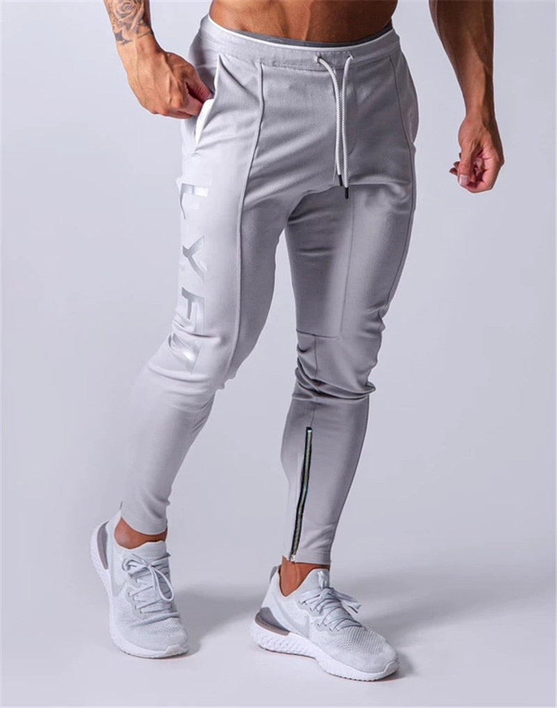 Sports pants men&#39;s jogger fitness sports trousers new fashion printed muscle men&#39;s fitness training pants